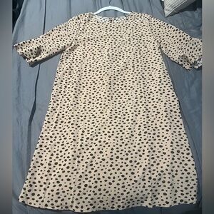 Printed dress, button back. Never worn
